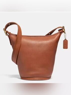 COACH - Duffle Sac Crossbody Bucket Bag in Amber Leather